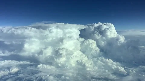 High altitude view of large cumulus storm clouds. Stock Footage 276767355