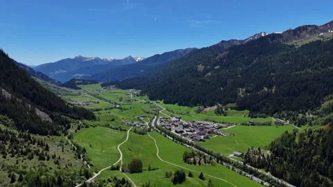 High Altitude View of Scenic Valley Village and Mountain Forests Video stock 343489173