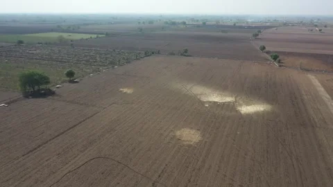 High altitude wide angle drone panorama showing a vast layout of flat brown Stock-Footage 337191728