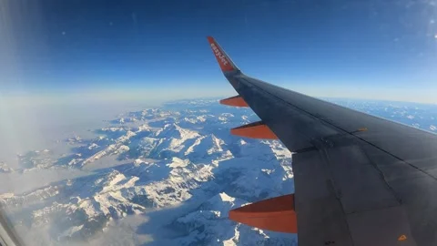High-altitude window view of Easyjet plane Stock Footage 296332178