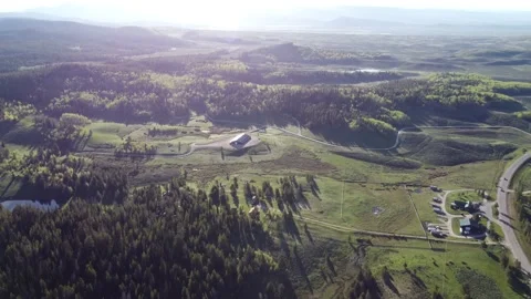 High and Wide Over a Ranch and Small RV Park in Beautiful Morning Light Stock Footage 197892013
