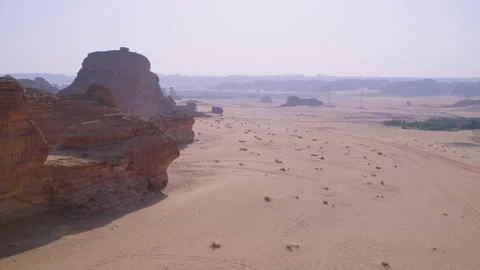 High and wide, reveal and circle of Al Ula UNESCO site, desert and rock, 4K Stock Footage 196811853