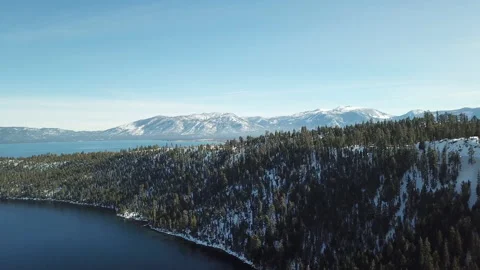 High Angle 4K Aerial Drone Footage over Clear Blue Lake Tahoe Stock Footage 143944472