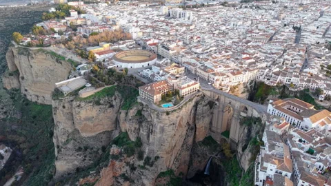 High-Angle Aerial Backwards Reveal of the Town of Ronda, Spain Stock Footage 312331460