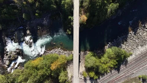 High Angle Aerial of Bridge Over Canyon Squamish River Stock Footage 346912595