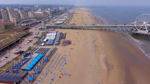 High-angle aerial drone panoramic view of Scheveningen beach resort coastline Stock Footage 337972441
