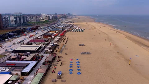 High-angle aerial drone panoramic view of Scheveningen beach resort coastline Stock Footage 337972471