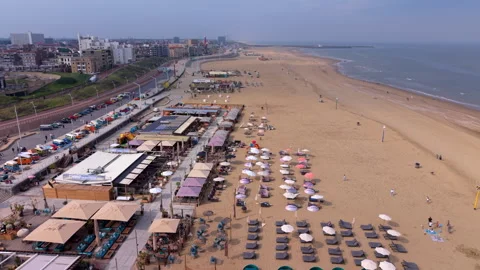 High-angle aerial drone panoramic view of Scheveningen beach resort featuring Stock Footage 337972555