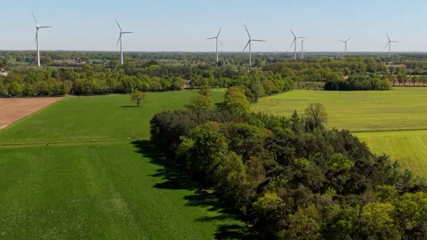 High-angle aerial drone scenic view of vibrant green agricultural fields Stock Footage 337972060