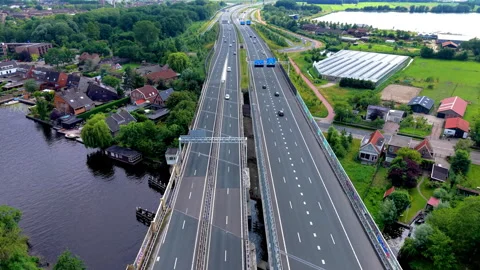 High angle aerial drone video clip of cars driving on multi-lane highway Stock Footage 342416588