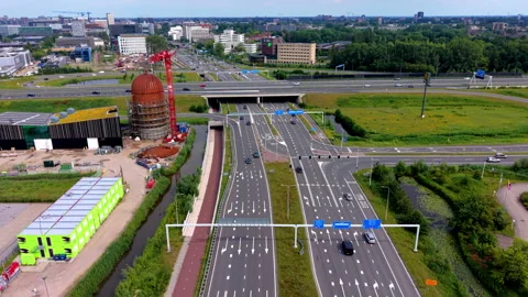High angle aerial drone video clip of multi-lane highway tunnel, vehicle Stock Footage 342441314