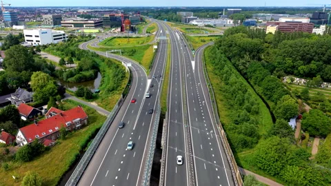 High angle aerial drone video clip of multi-lane highway interchange Stock Footage 342443414