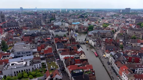 High-angle aerial drone view of Ghent historic city center with a winding Stockbeeldmateriaal 337910531
