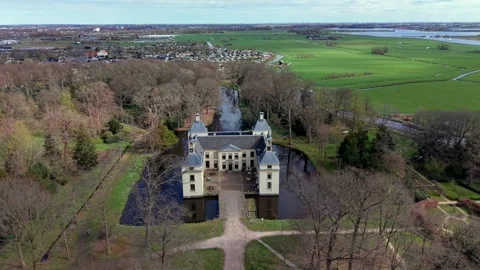 High-angle aerial drone view of a historic symmetrical Dutch castle Видео 338130653