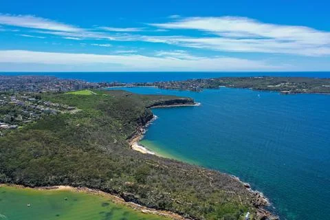 High angle aerial drone view of Grotto Point and Washaway Beach in the subu.. Stock Photos