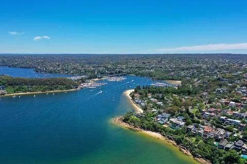 High angle aerial drone view of Spit Bridge, Clontarf Beach and Sandy Bay i.. Stock Photos
