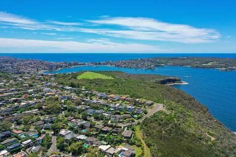 High angle aerial drone view of Grotto Point and Washaway Beach in the subu.. Stock Photos