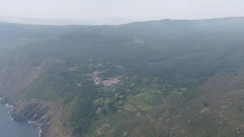 High-angle aerial footage showcasing the scenic coastal village of San Andres de Stock Footage 346702138