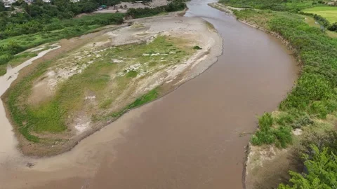 High angle aerial forward shot of wide river meander and gravel bar. Stock Footage 340515058