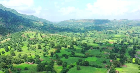 High Angle Aerial Move Over Rural India With Green Undulating Landscape Stock Footage 154861727