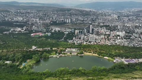 High-angle aerial panorama of Turtle Lake and Tbilisi city skyline. Stock Footage 339863985