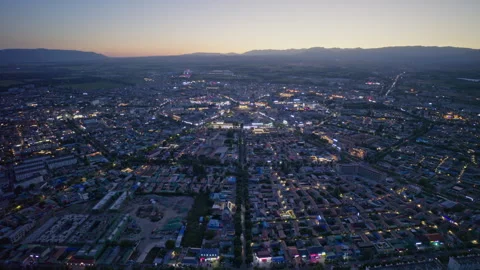 High-Angle Aerial Panoramic View of Tekes Bagua City Nightscape at Dusk Stockbeeldmateriaal 343586563