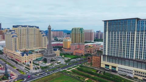 High Angle Aerial Parallax Full Cotai Strip Eiffel Tower Parisian Venetian Stock Footage 334768222