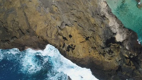 High Angle Aerial of Rocky Cliffside in Oahu, Hawaii Stock Footage 89185295