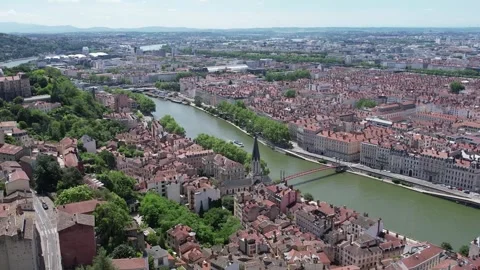 High-Angle Aerial of Saone River, Saint-Georges Church, and Lyon Cityscape, Video stock 348296057
