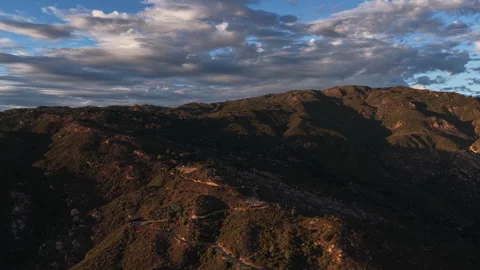 High angle aerial shot of dramatic afternoon light and deep shadow patterns Stock Footage 345803301