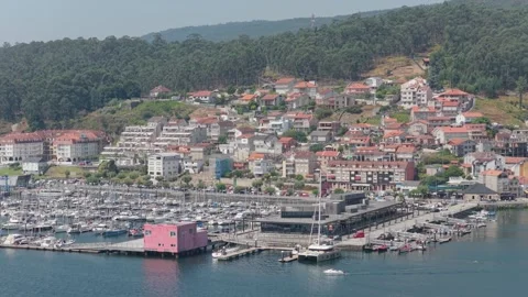 A high-angle aerial shot of the marina in Combarro, Spain, showcasing numerous Stock Footage 346721848