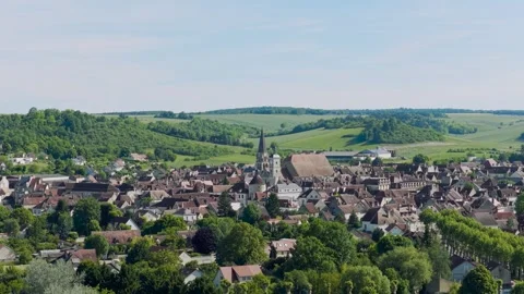 A high-angle aerial shot of Vermenton, a picturesque village in Burgundy, France Stock Footage 346673107