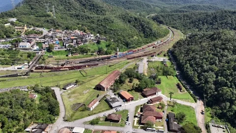 High-Angle Aerial Tracking Shot of Locomotive at Paranapiacaba Railway Yard Stock-Footage 344908642