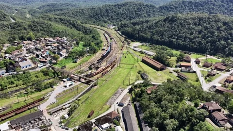 High-Angle Aerial Tracking Shot of Locomotive at Paranapiacaba Railway Yard Stock Footage 344908655