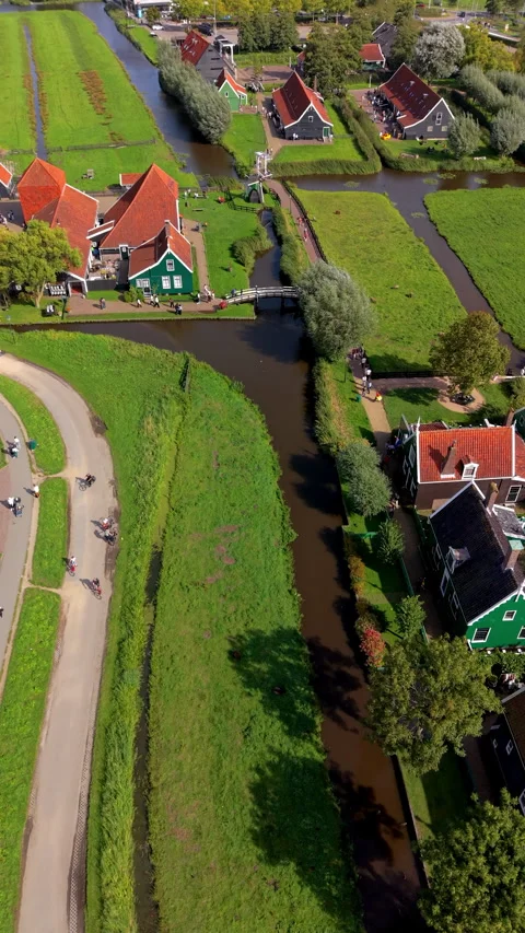 High angle aerial vertical frame of historic Dutch village Zaanse Schans Stock Footage 348451139