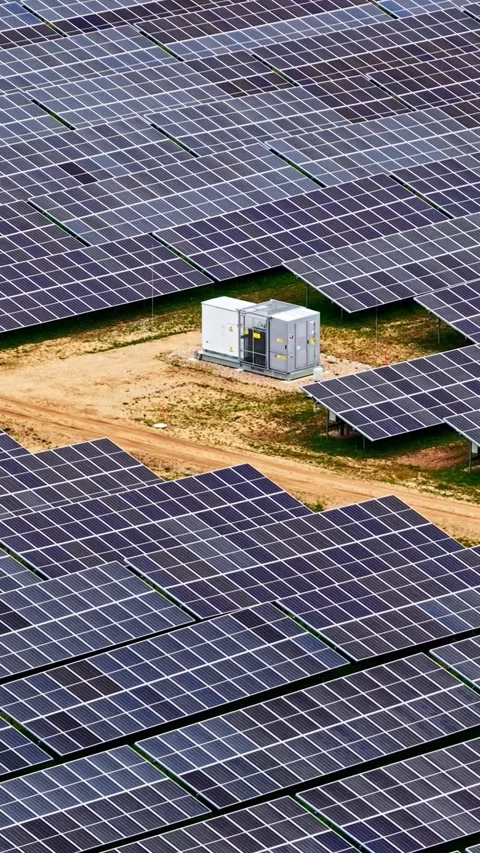 High-angle aerial vertical shot looking down at a large solar array grid Stock-Footage 337036055