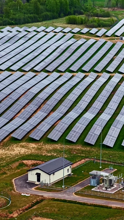 High-angle aerial vertical shot looking down at a large solar array grid Stock-Footage 337047684