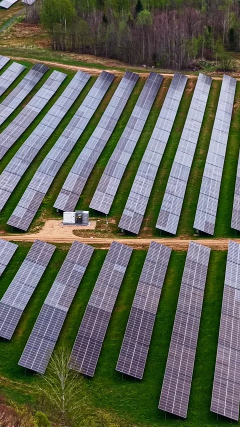 High-angle aerial vertical shot looking down at a large solar array grid Stock-Footage 337049097