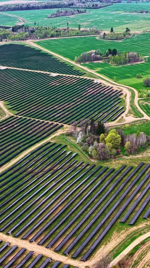 High-angle aerial vertical shot looking down at a large solar array grid Stock-Footage 337049188