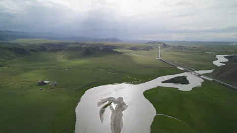 High-Angle Aerial View of Bayanbulak Canyon Wetland and Kaidu River Stock Footage 343054772