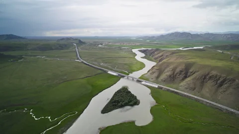 High-Angle Aerial View of Bayanbulak Canyon Wetland and Kaidu River Stock Footage 343058211