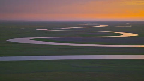 High-Angle Aerial View of Bayanbulak Nine Bends at Dusk Sunset Stock Footage 343066585