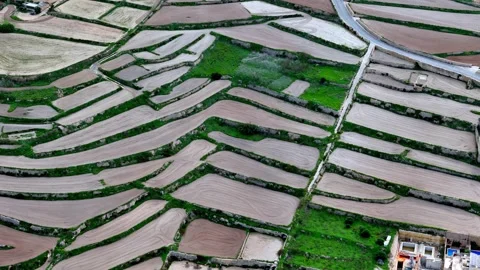 High angle aerial view capturing the ancient story of terraced farming in Stock Footage 327428297