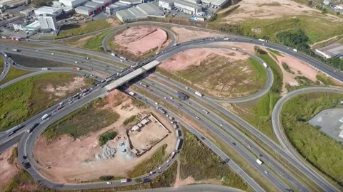 High-Angle Aerial View of a Complex Highway Interchange and Traffic Vídeos de archivo 346845678