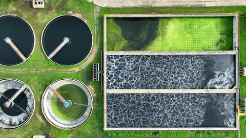 High angle aerial view of industrial wastewater treatment. 스톡 동영상 343617812