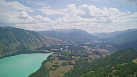 High-Angle Aerial View of Kanas Lake, Kanas River, Old Village and New Village Stock Footage 344011240