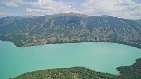 High-Angle Aerial View of Kanas Lake under Blue Sky and White Clouds Stock Footage 344011300