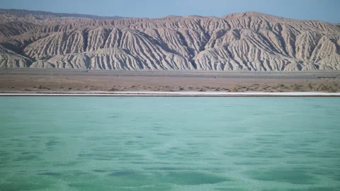 High-Angle Aerial View of Mangya Emerald Lake and Altun Mountains Hero Ridge Stock Footage 343795952