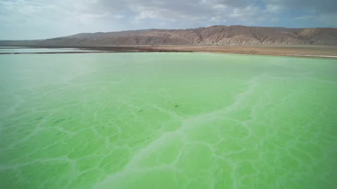 High-Angle Aerial View of Mangya Emerald Lake and Altun Mountains Hero Ridge Stock Footage 343796257