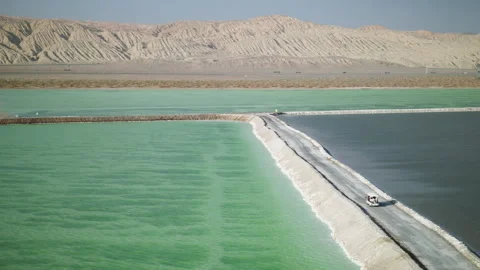 High-Angle Aerial View of Mangya Emerald Lake in Qingha Stock Footage 343798121